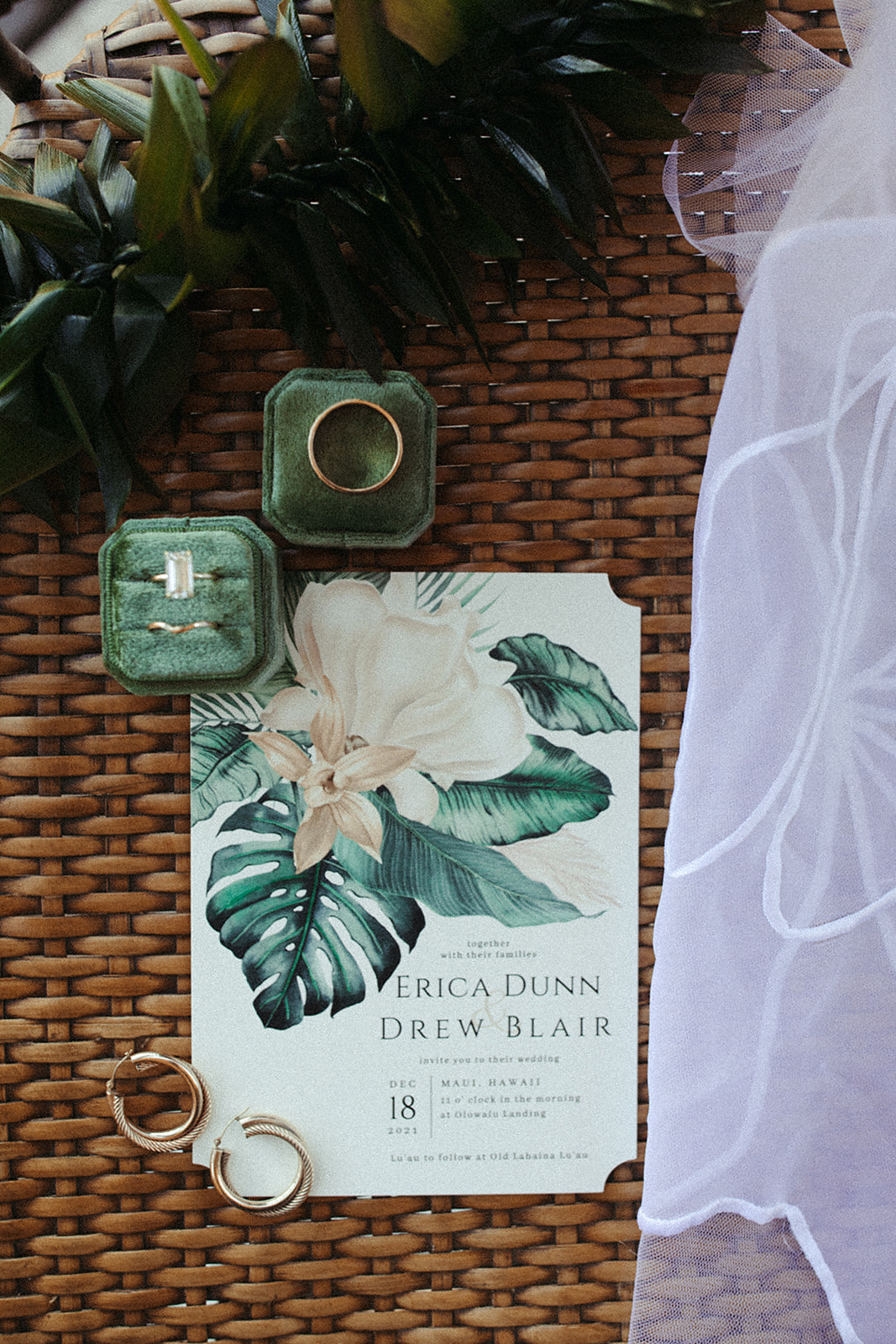 beach destination wedding invitation with bridal jewelry, greenery, and veil